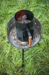 BBQ Chimney Starter assists with Getting Lump Charcoal upto heat quickly.